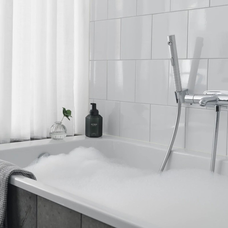 Altered design shower head to save water in the home