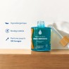 Parfum concentré Ops Clean Douce Innocence: flacon bleu translucide avec bouchon, affichant hypoallergénique et biodégradable, t